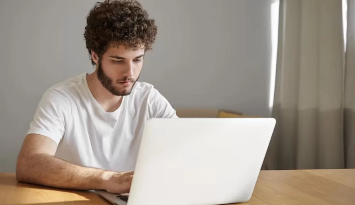 Man looking at laptop