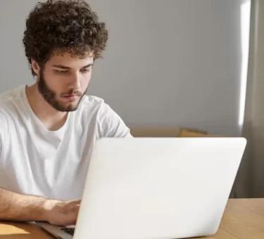 Man looking at laptop